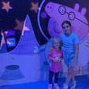 Autumn, four and Primrose, nine, enjoy the interactive experience at the NEC