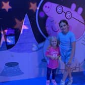 Autumn, four and Primrose, nine, enjoy the interactive experience at the NEC