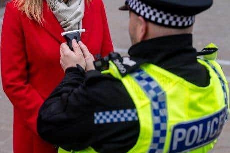 The woman failed a roadside breath test.