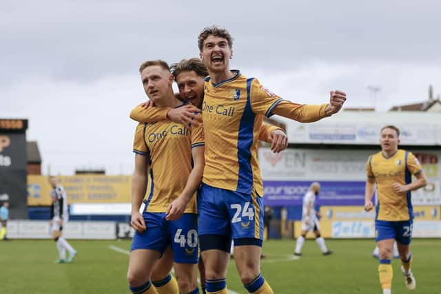 Lewis Brunt has signed for Wrexham following last season's loan spell with Mansfield Town.