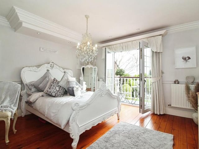 This photo shows how the third bedroom at the house opens out on to its own balcony.