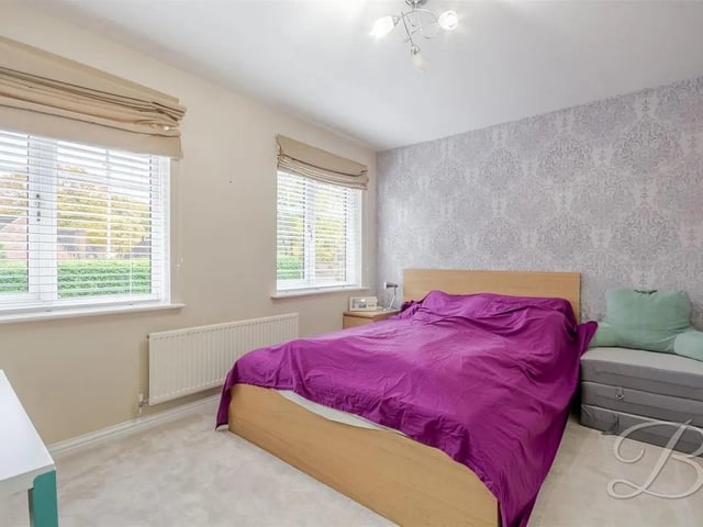 The property features five bedrooms, perfect for a growing family.