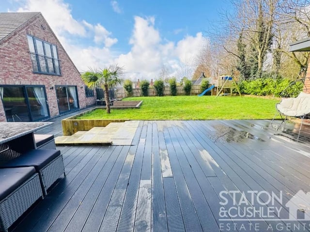 To the rear the garden is a wonderful private space which you can enjoy all year round. There are several areas to the garden including a fabulous sized lawn, a large patio with built-in seating and hot tub as well as a decking area which creating a great feel of space, surrounded by an array of stunning trees. Last but not least there is an outdoor bar... Ideal for a sociable household which has a fitted bar and pumps as well as seating and its own WC.