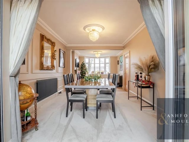 The stunning dining room is the perfect place for family meals or entertaining.