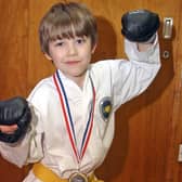 2007: Six-year-old Brandon Wilson won a gold medal in sparring for the Eastwood Tae-Kwon-Do Club.