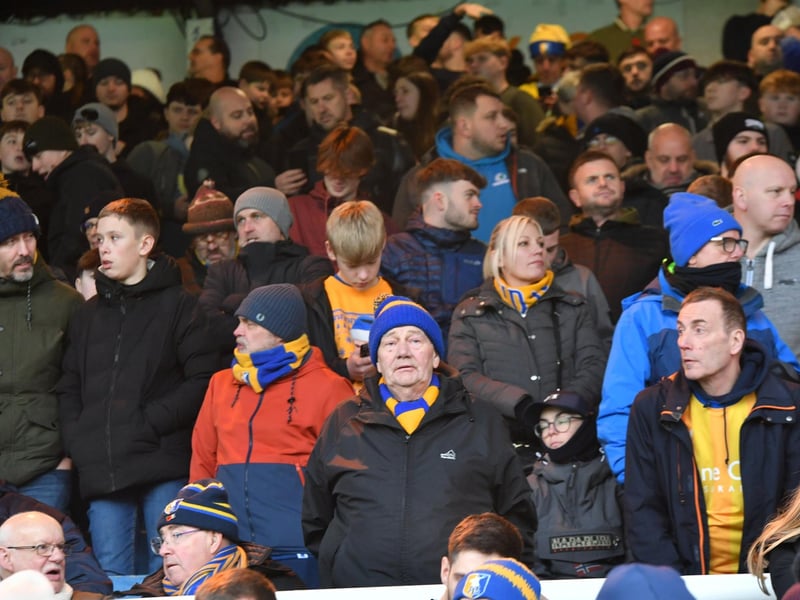 Mansfield Town fans watch the brilliant win at Peterborough United.