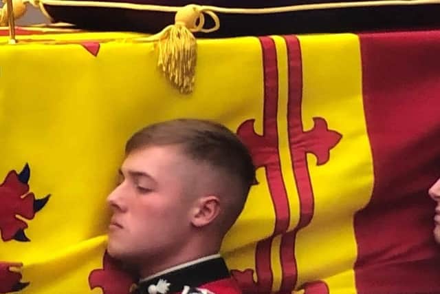 Luke Simpson helping to carry the Queen's coffin at Westminster on Monday, September 19.