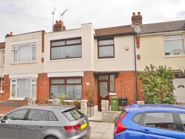 Three-bedroom family house close to shops, schools and the Baffins Pond recreation area. The home is spread over two floors and includes a dining room and separate sitting room. It has a low maintenance rear garden with rear pedestrian and vehicular access to gated hardstanding and a garage.