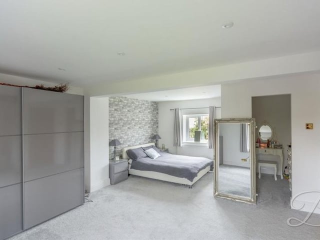 The second double bedroom at the barn conversion is also spacious and also has access to a dressing room. There is an en suite shower room too.