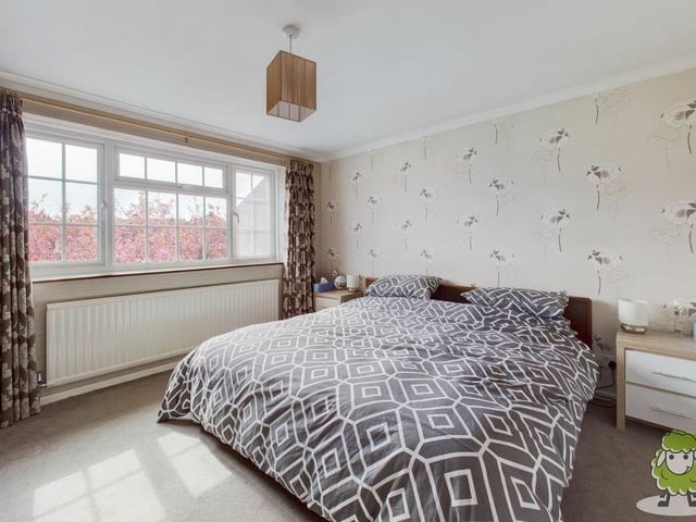 A stylish fourth double bedroom at the Selston house, with front-facing views.