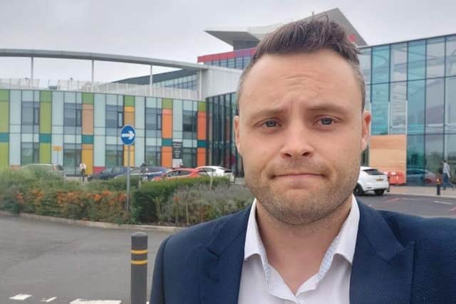 Coun Ben Bradley outside King's Mill Hospital.