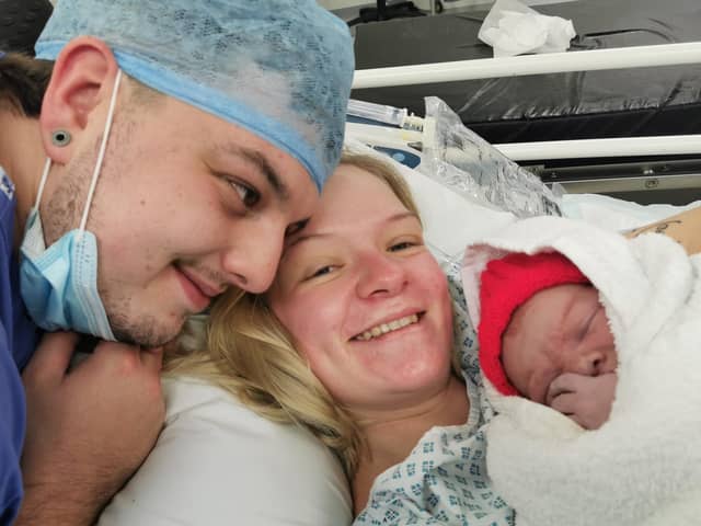 This year's Rocking baby, Francis Stephen Vasey, with his mum and dad, George and Georgia, who live on The Crescent in Blidworth.