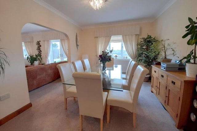 From the lounge and through the archway, you come across this delightful dining room. With coving to the ceiling, it has a double-glazed window overlooking the back garden.