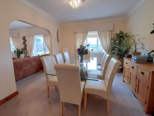 From the lounge and through the archway, you come across this delightful dining room. With coving to the ceiling, it has a double-glazed window overlooking the back garden.