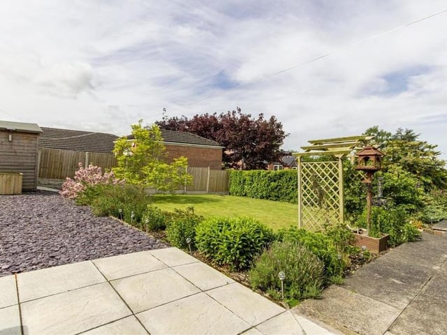 This is the view from the patio, overlooking the back garden. Relaxing in the sunshine wouldn't be a problem!