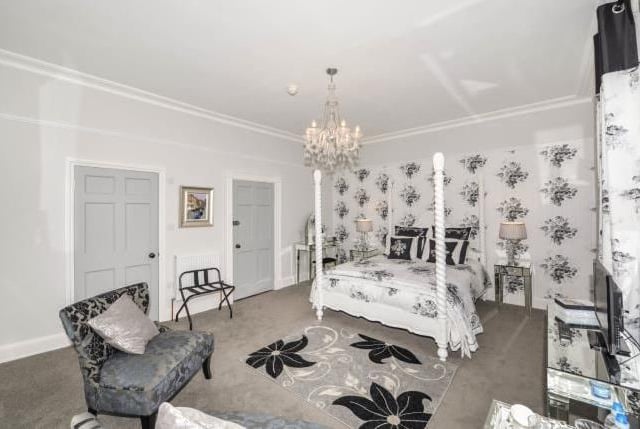 Inside one of the property's eight bedrooms.