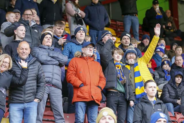Travelling Stags fans watch the Sky Bet League 2 match against Bradford City.