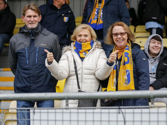 Mansfield fans at The EnviroVent Stadium for the match against Harrogate Town.