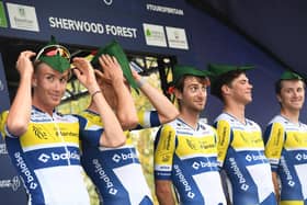 Kamiel Bonneu, Sander De Pestel, Milan Fretin, Elias Maris, Alex Colman of Team Flanders Baloise before the start of Stage 4 of the 2023 Tour of Britain in Sherwood Forest wearing Robin Hood hats.