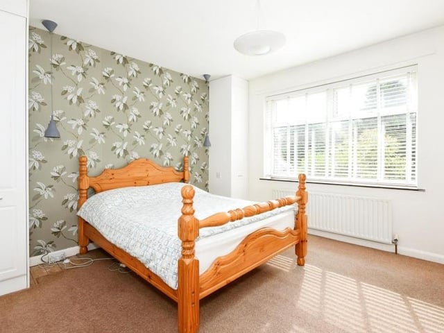 Five of the six bedrooms are doubles, including this one, which also has a fitted wardrobe.