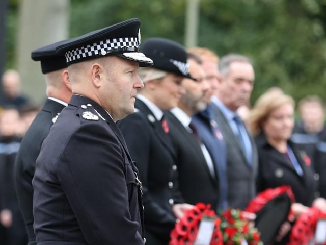 Police officers marking Armistice Day at the Nottinghamshire force headquarters