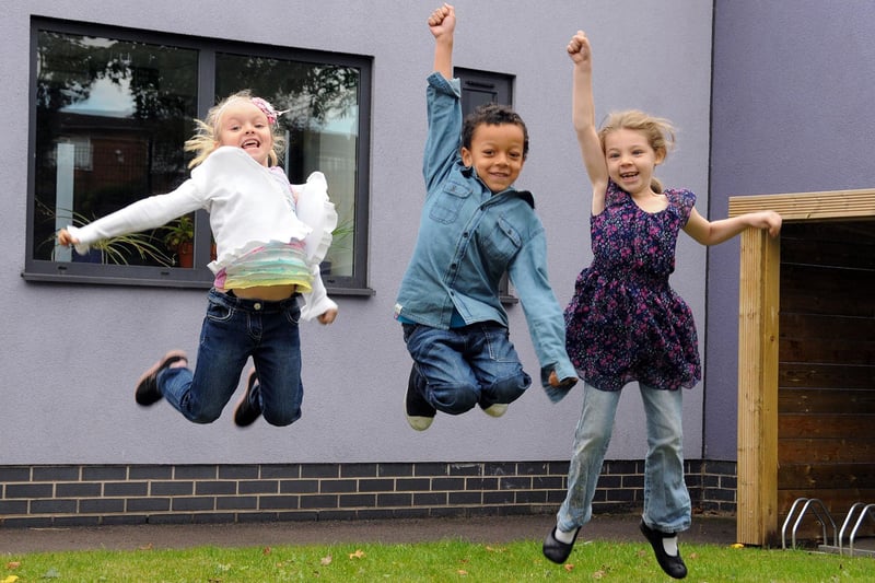 Oak Tree Primary School pupils Amelia Challis, Skye Bowen and Jermaine Smalley are all smiles after swapping their school uniform for their favourite denims to raise money for Jeans for Genes day last Frdiay.