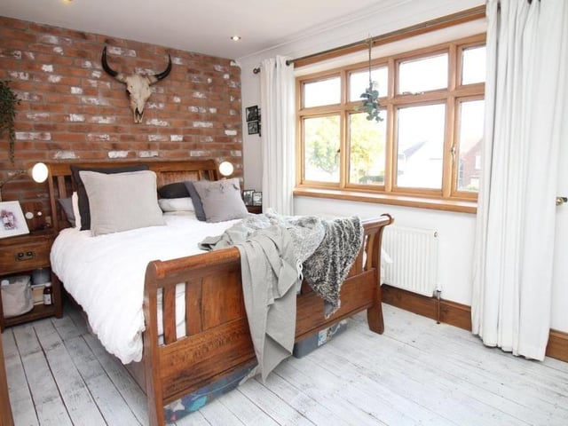 Another shot of the main bedroom, which is bright and light thanks to a solid wood, double-glazed window overlooking the front of the house.