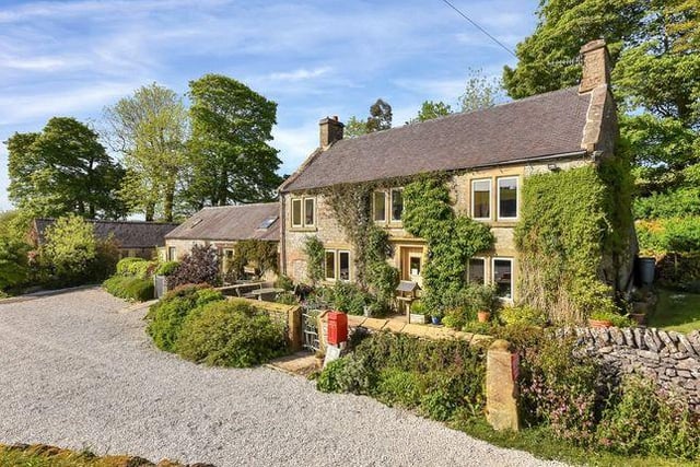This three bedroom farmhouse comes with four luxury holiday cottages is marketed by Fisher German, 01530 658941.