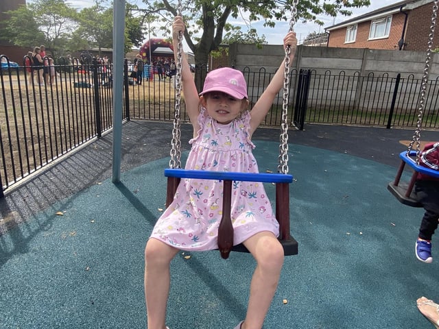 Children try out the new play area