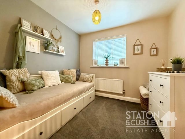 One of four bedrooms in the spacious property