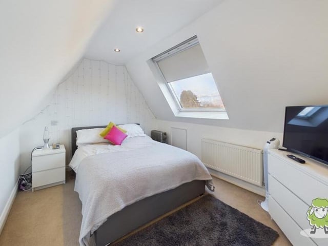 In one part of the second-floor bedroom is the compact but cute bed space........