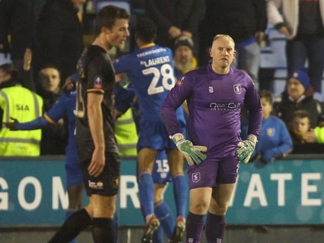 Shrewsbury celebrate their second goal in stoppage time.