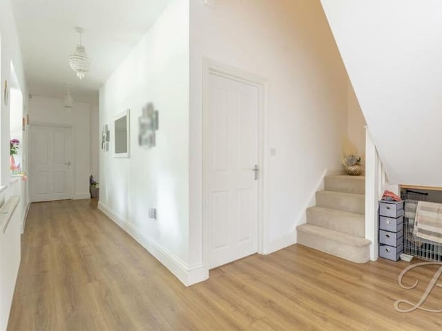 As we prepare to take a look at the first floor, let's pass through the entrance hall to the staircase.