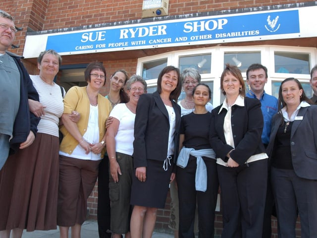 Staff and volunteers from the Sue Ryder Shop at Ollerton pictured with supporters from Wheels and Co and Tesco during the Volunteer week on 2007.