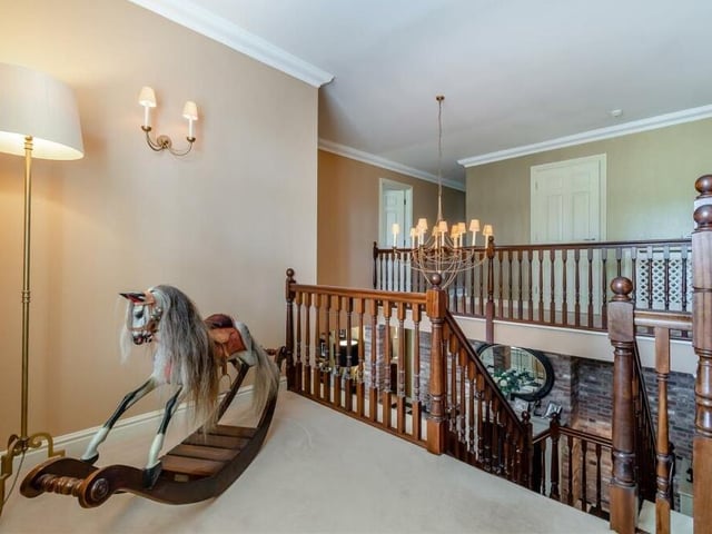 Time to check out the first floor now, so here is the galleried landing, which leads to all four double bedrooms and the family bathroom.