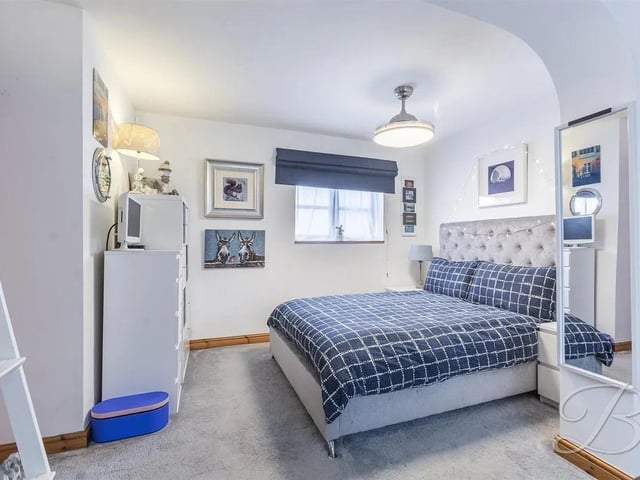 One of three spacious double bedrooms.