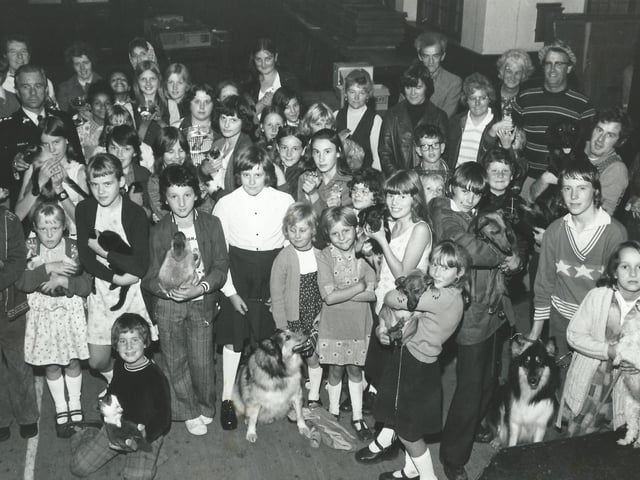 Members of Uncle Jim's Chads Club pictured with the RSPCA inspector and some parents.
