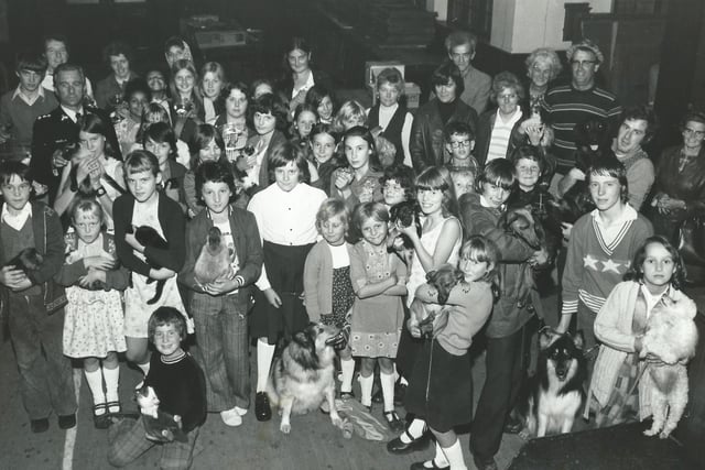 Members of Uncle Jim's Chads Club pictured with the RSPCA inspector and some parents.