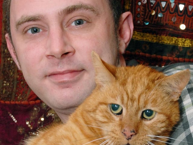 Phil McGuire with cat Indie. 2011.