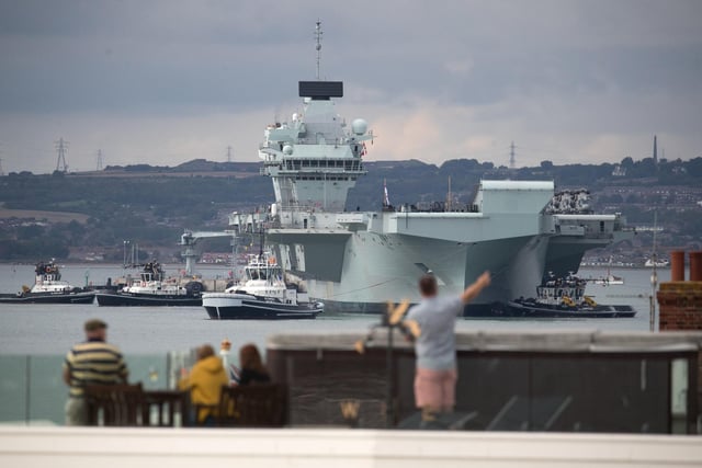 The Royal Navy aircraft carrier HMS Queen Elizabeth leaves Portsmouth. Picture: Andrew Matthews/PA Wire