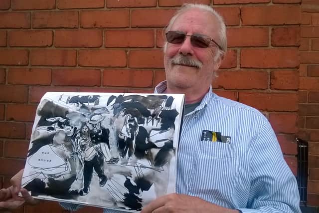 Artist Bob Evans with one of three new works inspired by his memories of WWII.