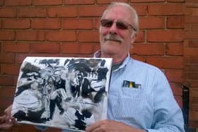 Artist Bob Evans with one of three new works inspired by his memories of WWII.