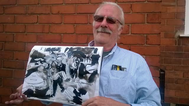 Artist Bob Evans with one of three new works inspired by his memories of WWII.