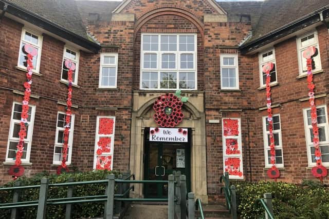 Poppies cover the walls and windows at High Oakham Primary School.