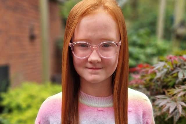 Emilia's beautiful long ginger locks 