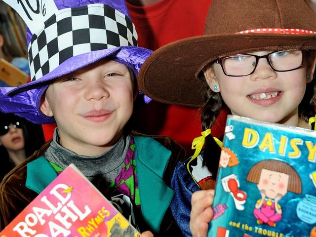 Pupils from the Peafield Lane Academy in 2018 are joined by  Paul Haywood from Forever Young Fancy Dress, on Toothill Lane, who provided the pupils with a costume for World Book Day after the class won a competition post on Facebook.
