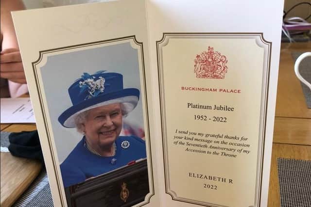 Lola also received a photo card from the Queen