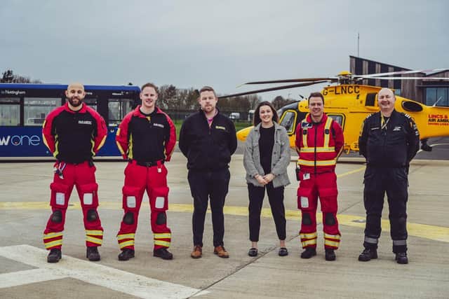 Lincs and Notts Air Ambulance team members with trentbarton’s Scarlet McCourt