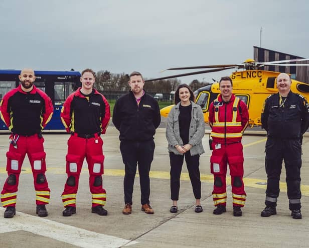 Lincs and Notts Air Ambulance team members with trentbarton’s Scarlet McCourt