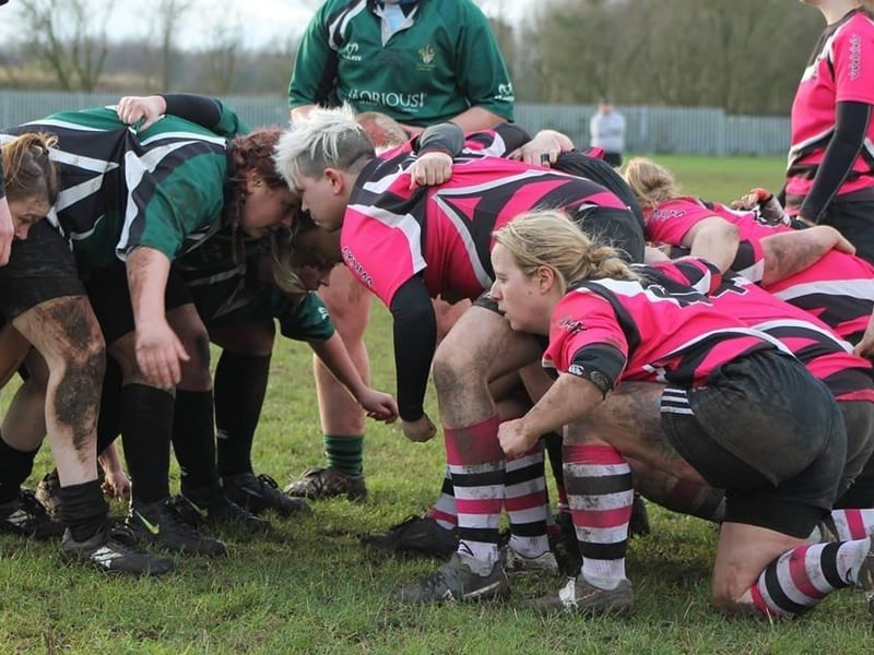 The Ashfield Ladies side form up for a scrum during a match.